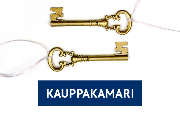 Kaksi kultaista avainta ja Kauppakamarin logo.